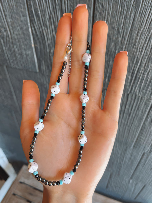 Le collier du joueur